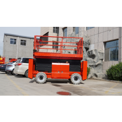 Side view of Scissor Lift highlighting its lifting platform, robust treaded tires, and side control panel